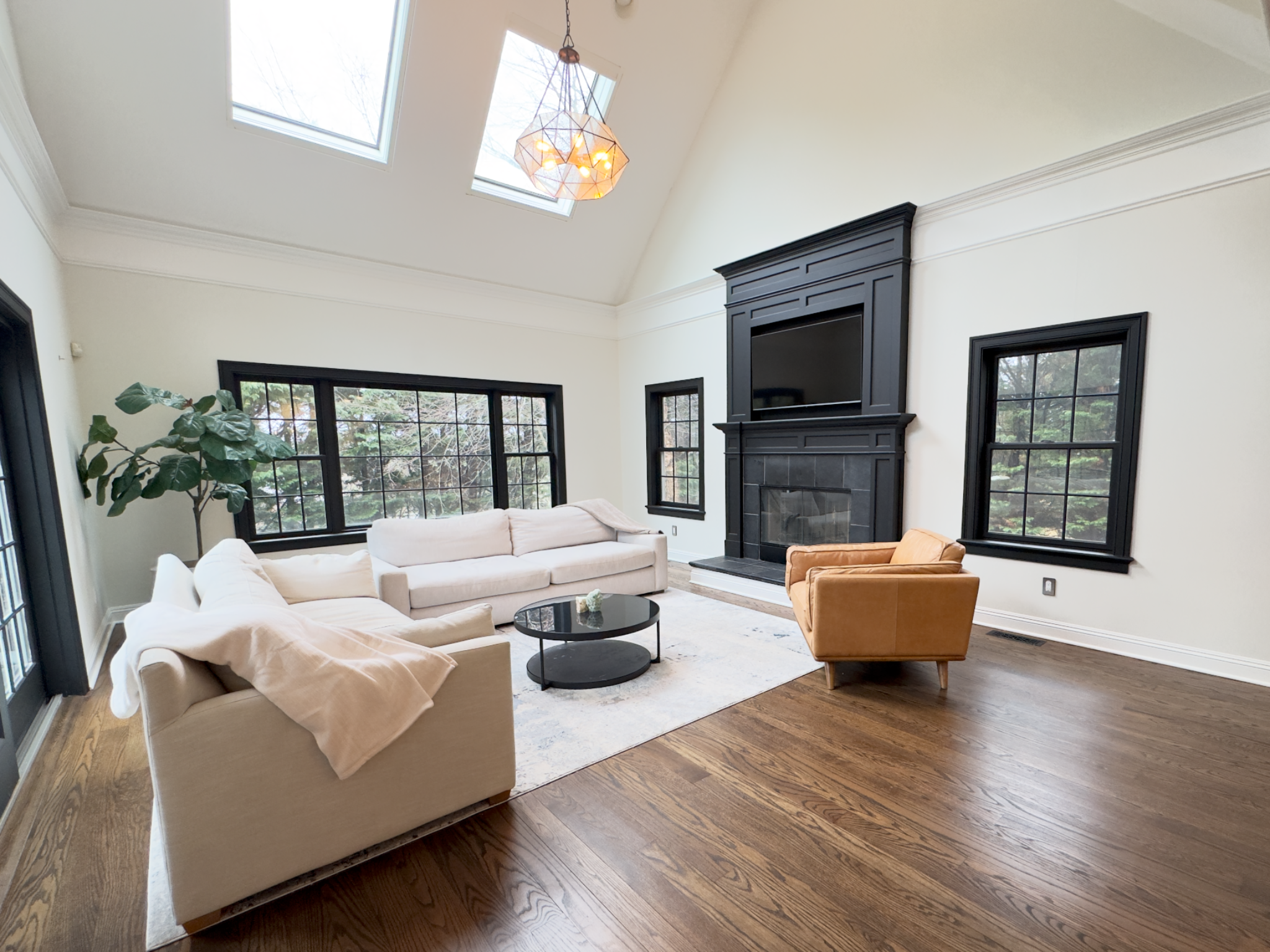 Vaulted living room with fireplace